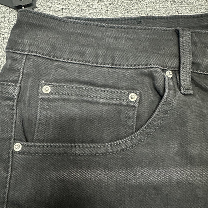 AMIRI Staggered Logo Distressed Skinny Jeans Washed Black