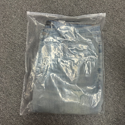 AMIRI Distressed Skinny Jeans Light Indigo