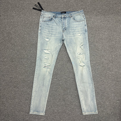 AMIRI Distressed Skinny Jeans Light Indigo
