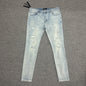 AMIRI Distressed Skinny Jeans Light Indigo