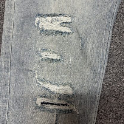 AMIRI Distressed Skinny Jeans Light Indigo