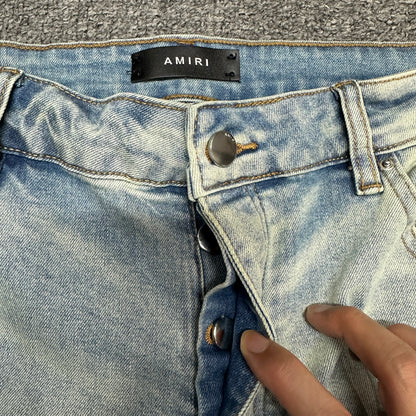 AMIRI Painter Staggered Logo Skinny Jeans Light Indigo