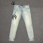 AMIRI Painter Staggered Logo Skinny Jeans Light Indigo