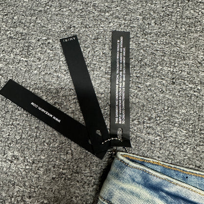 AMIRI Painter Staggered Logo Skinny Jeans Light Indigo