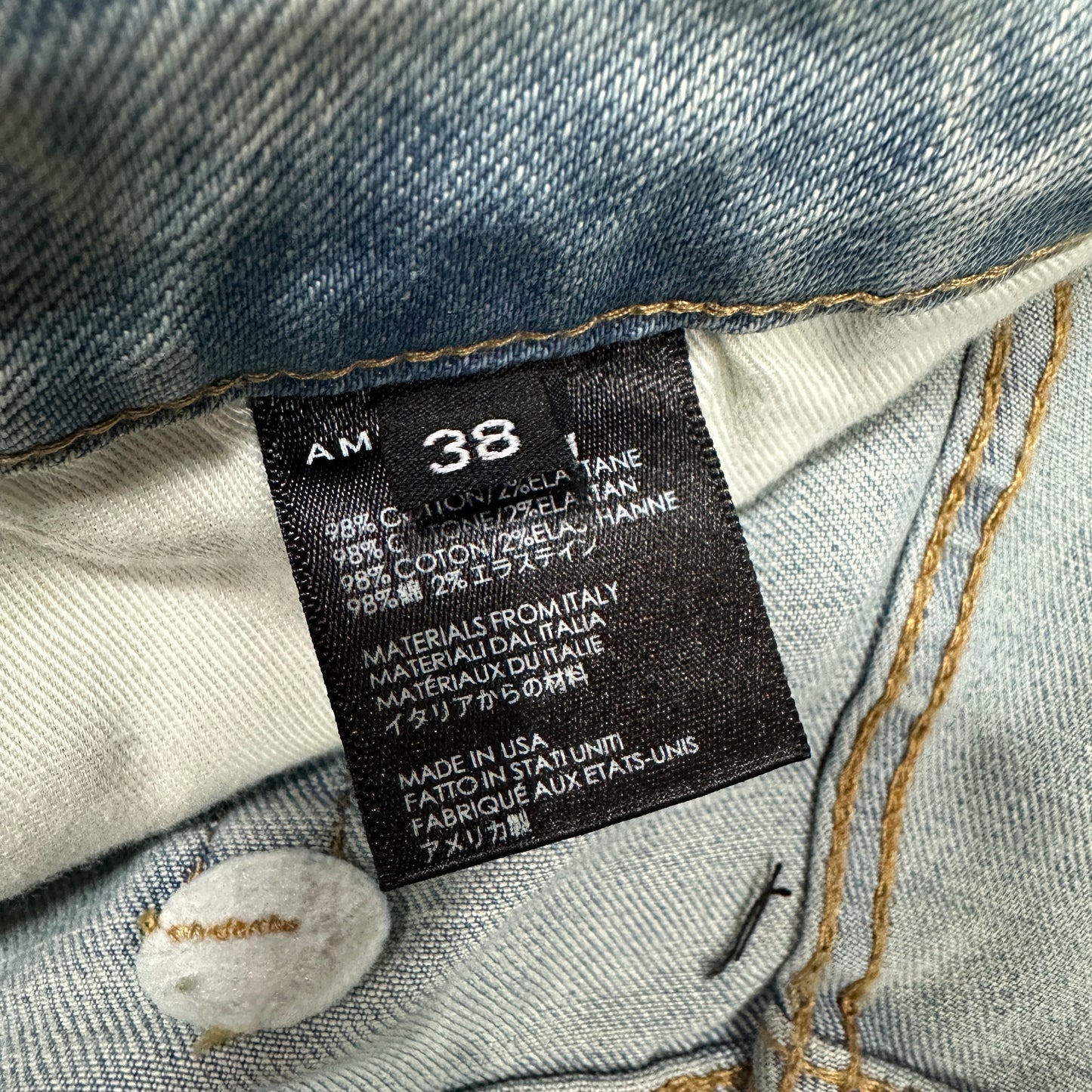 AMIRI Staggered Logo Distressed Skinny Jeans Antique Indigo