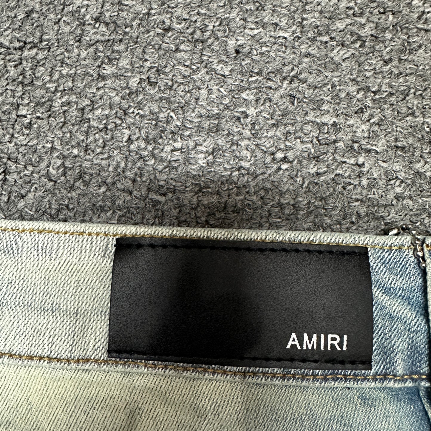 AMIRI Staggered Logo Distressed Skinny Jeans Antique Indigo