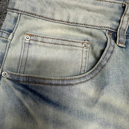 AMIRI Staggered Logo Distressed Skinny Jeans Antique Indigo