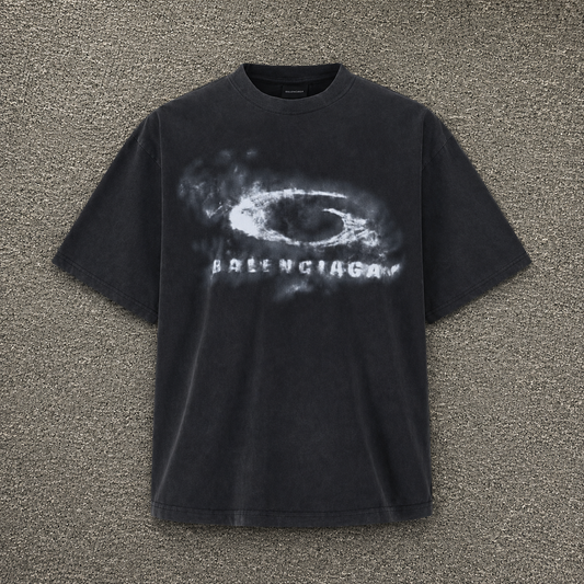 Vintage black Balenciaga tee with faded eye graphic print