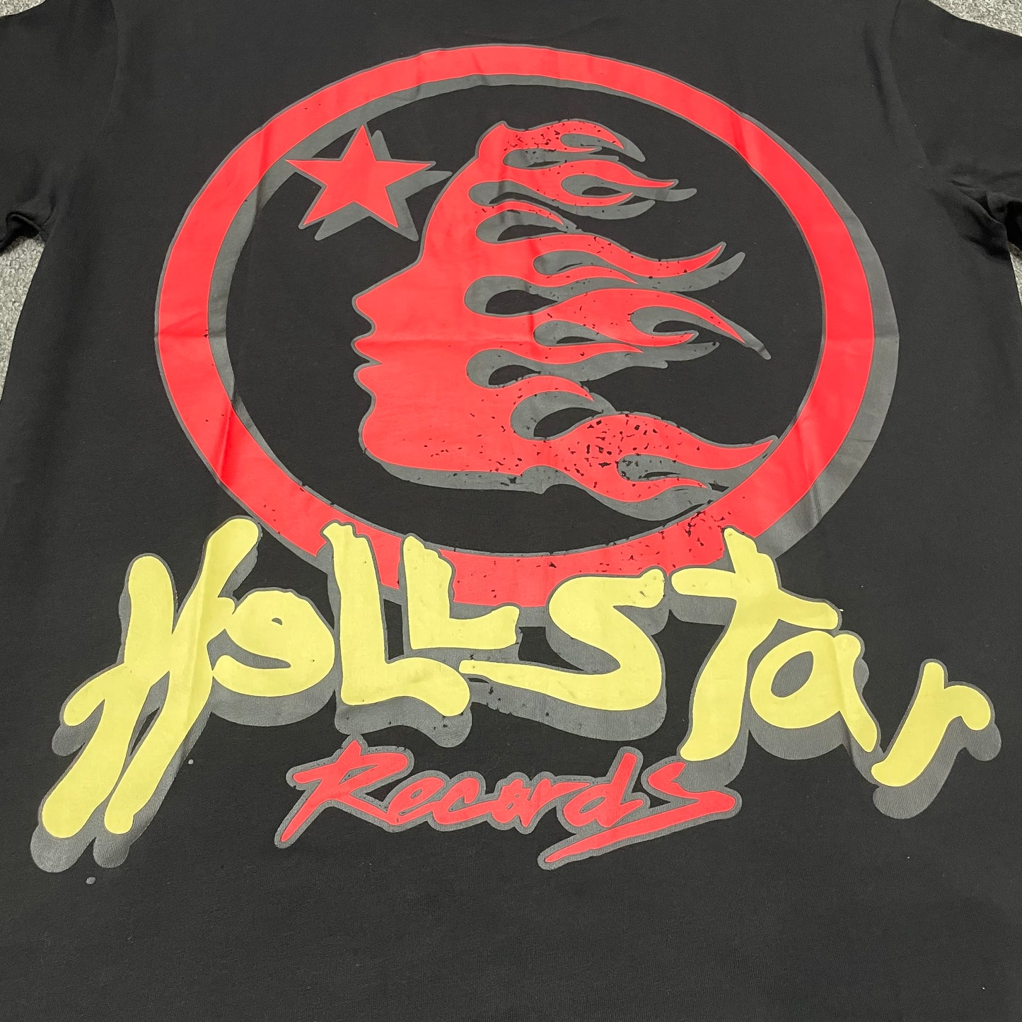 Full oversized Earth and headphones graphic print on the Hellstar Records Heaven Sounds Like T-Shirt
Close-up of the multicolor Earth and headphones graphic on the Hellstar Records T-Shirt
Detailed view of the cracked Earth texture, flame graphics and Hellstar Records lettering print