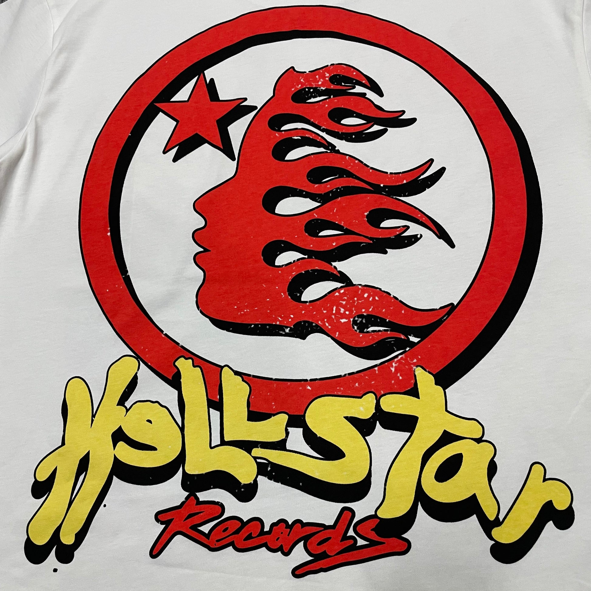 Full oversized Earth and headphones graphic print on the Hellstar Records Heaven Sounds Like T-Shirt
Close-up of the multicolor Earth and headphones graphic on the Hellstar Records T-Shirt
Detailed view of the cracked Earth texture, flame graphics and Hellstar Records lettering print