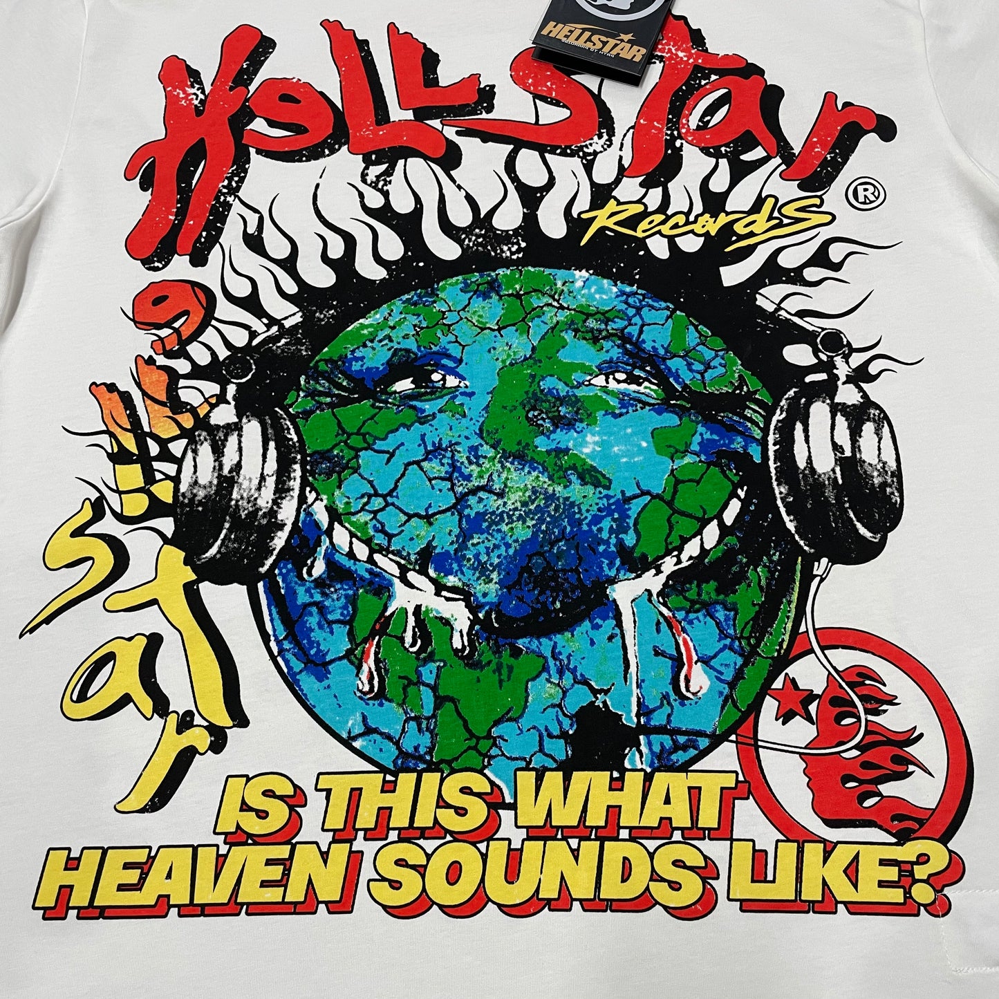 Full oversized Earth and headphones graphic print on the Hellstar Records Heaven Sounds Like T-Shirt
Close-up of the multicolor Earth and headphones graphic on the Hellstar Records T-Shirt
Detailed view of the cracked Earth texture, flame graphics and Hellstar Records lettering print