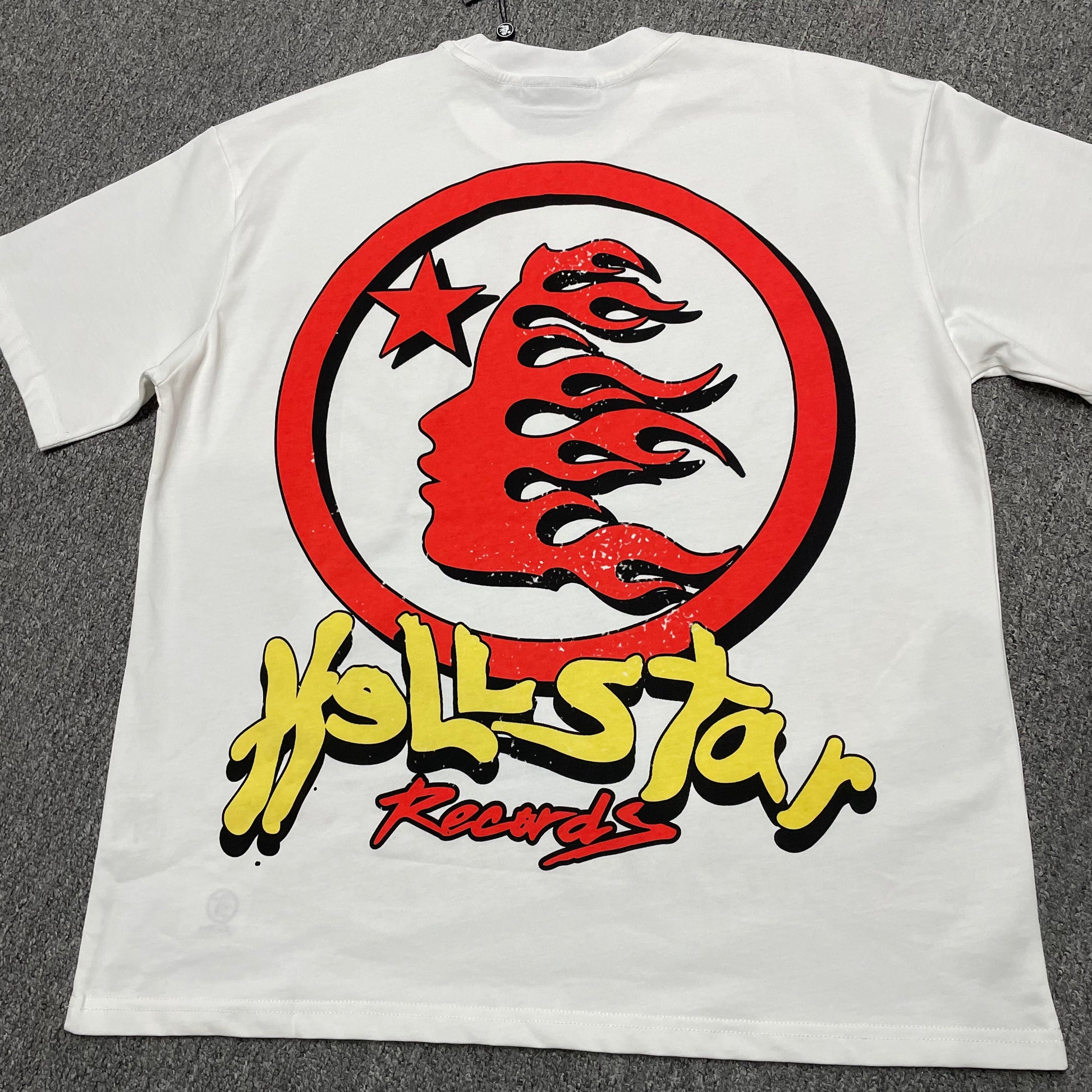 Full oversized Earth and headphones graphic print on the Hellstar Records Heaven Sounds Like T-Shirt
Close-up of the multicolor Earth and headphones graphic on the Hellstar Records T-Shirt
Detailed view of the cracked Earth texture, flame graphics and Hellstar Records lettering print
