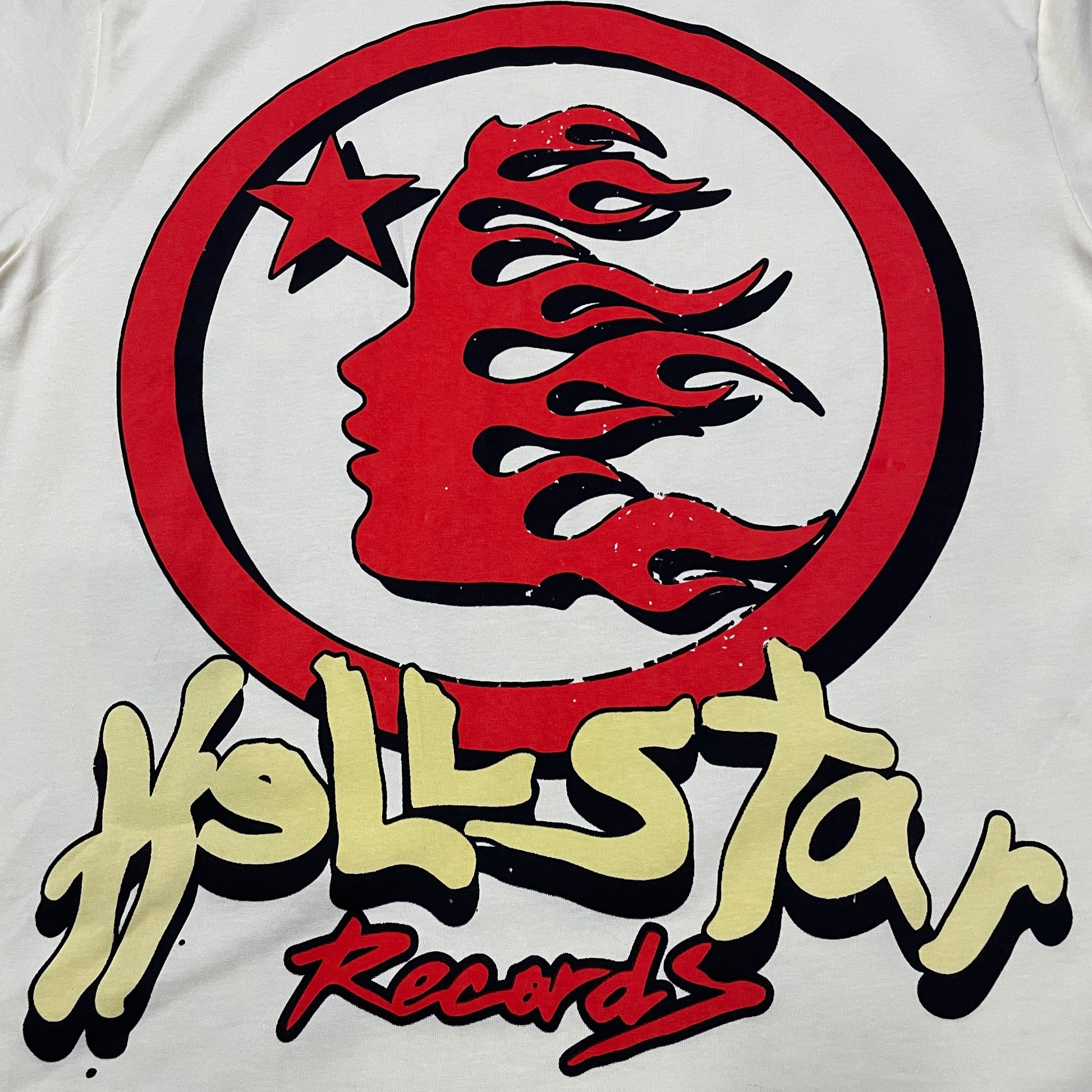 Full oversized Earth and headphones graphic print on the Hellstar Records Heaven Sounds Like T-Shirt
Close-up of the multicolor Earth and headphones graphic on the Hellstar Records T-Shirt
Detailed view of the cracked Earth texture, flame graphics and Hellstar Records lettering print