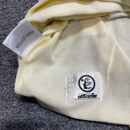 NFC tag detail on the Hellstar Yoga School of Enlightenment T-Shirt for wholesale product inspection