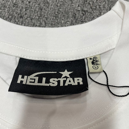 Hellstar branded neck label and crew-neck stitching on the Path to Paradise T-Shirt
Close-up of the Hellstar flame logo hangtag and attachment details