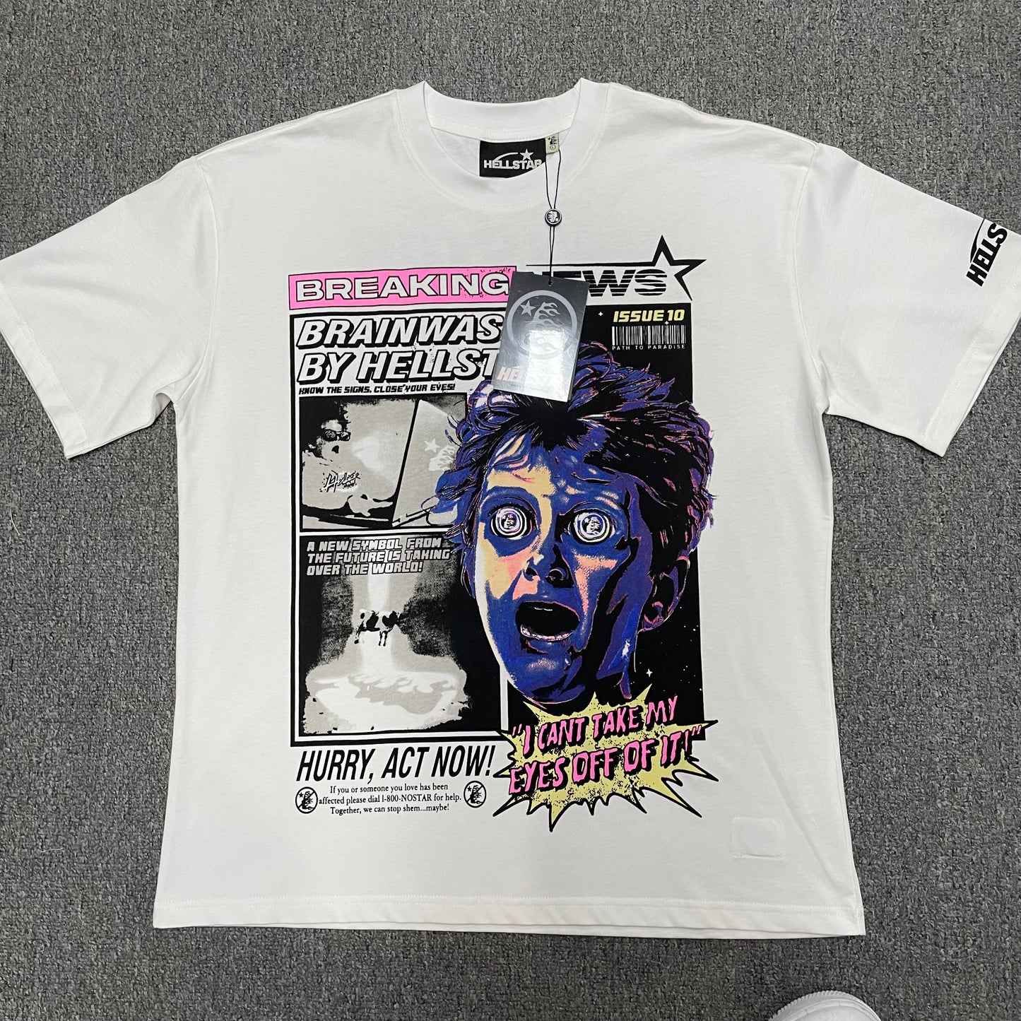 Hellstar Breaking News T-Shirt in white front view with oversized comic-style brainwashed face graphic
