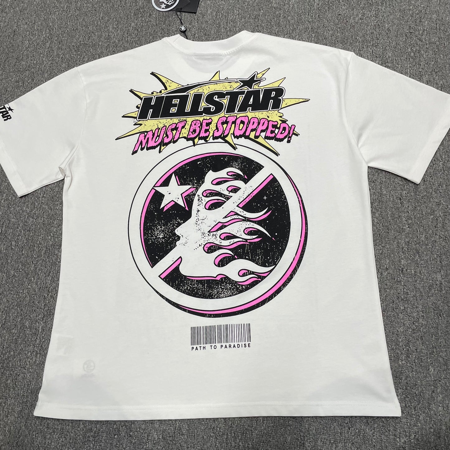 Hellstar Breaking News white T-shirt back view showing the full rear graphic artwork