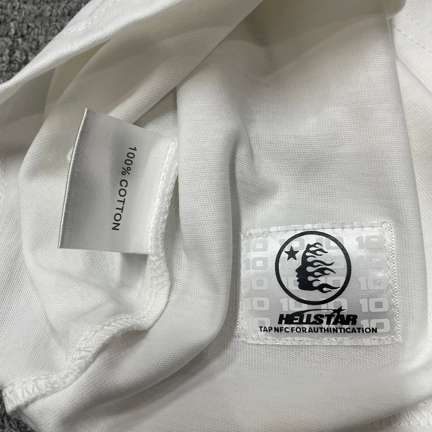 NFC tag detail on the Hellstar Sports Logo T-Shirt for wholesale product inspection