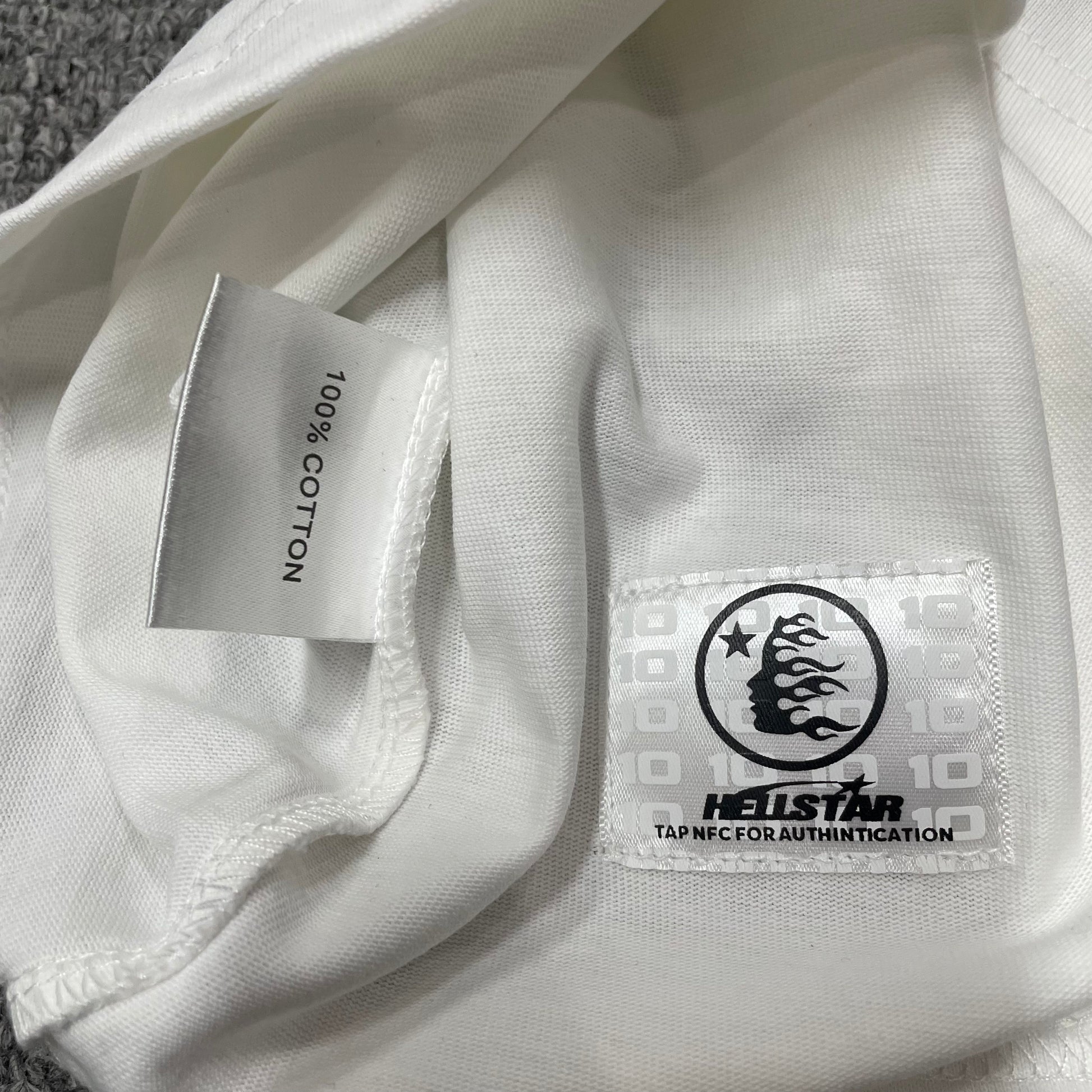 NFC tag detail on the Hellstar Sports Logo T-Shirt for wholesale product inspection
