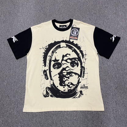 Hellstar Helmet Tee in Cream and Black front view with oversized helmeted face graphic