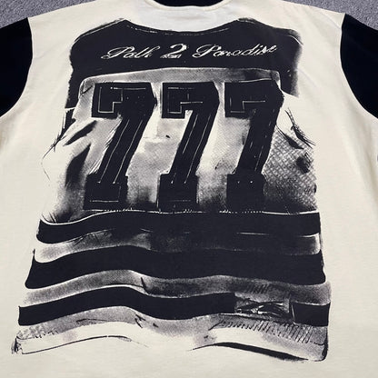 Full back graphic artwork on the Cream and Black Hellstar Helmet Tee
Close-up of the rear graphic print on the Hellstar Helmet T-Shirt
Detailed view of the distressed rear artwork on the Hellstar Helmet graphic T-shirt
