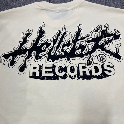 Full back graphic artwork on the Cream and Black Hellstar Helmet Tee
Close-up of the rear graphic print on the Hellstar Helmet T-Shirt
Detailed view of the distressed rear artwork on the Hellstar Helmet graphic T-shirt