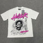 Hellstar Helmet Tee in Cream and Black front view with oversized helmeted face graphic