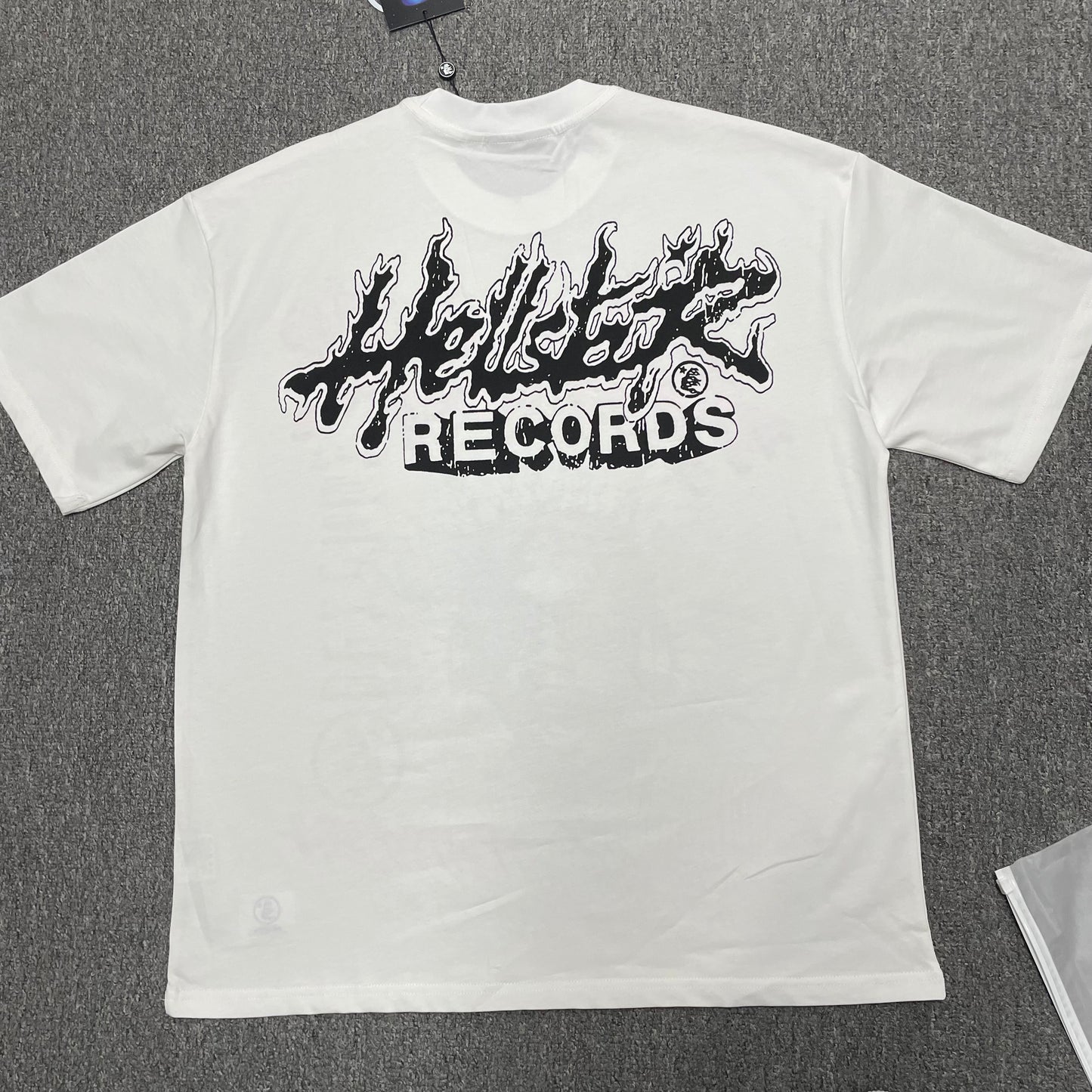 Hellstar Helmet Tee in Cream and Black back view with full rear graphic artwork