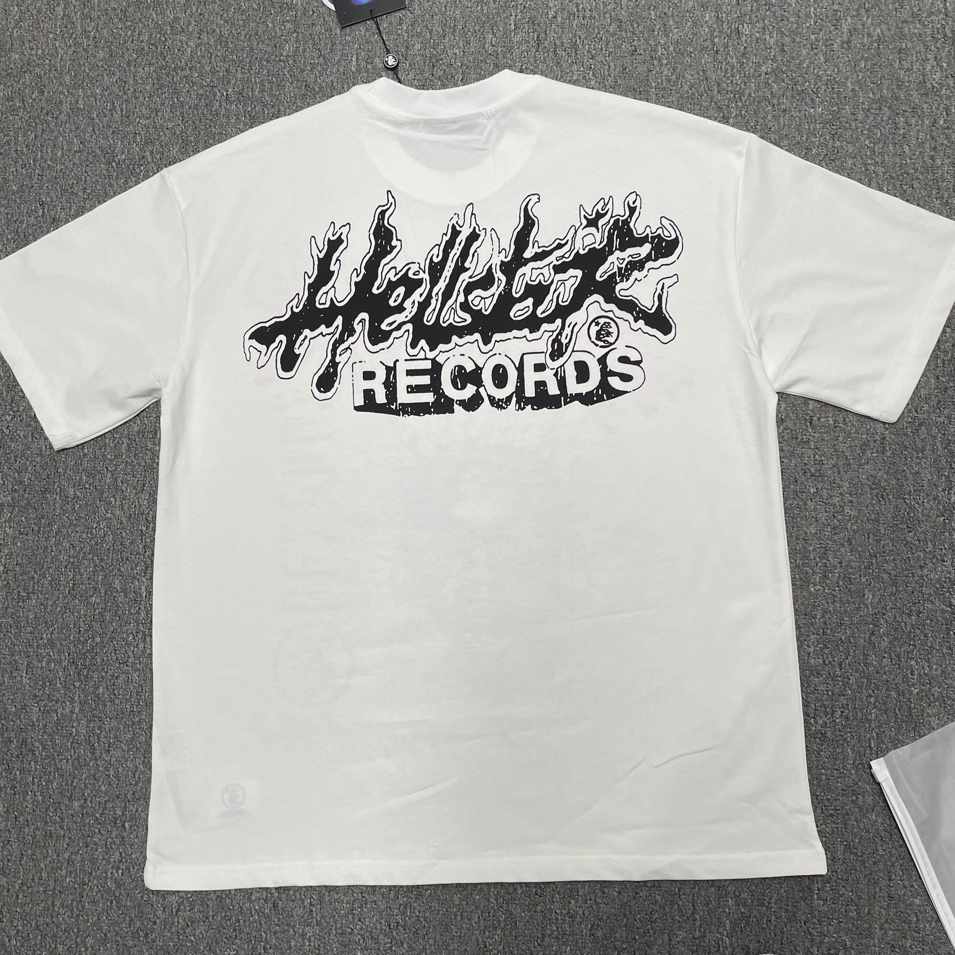 Hellstar Helmet Tee in Cream and Black back view with full rear graphic artwork