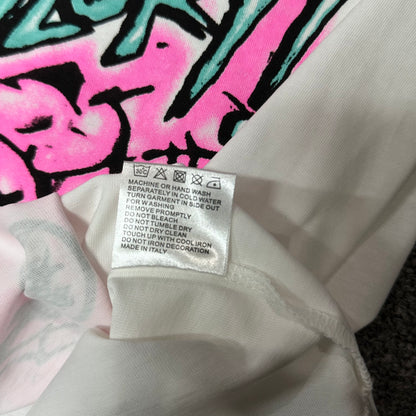 Hellstar No Guts No Glory T-Shirt wash label showing fabric size and garment care information