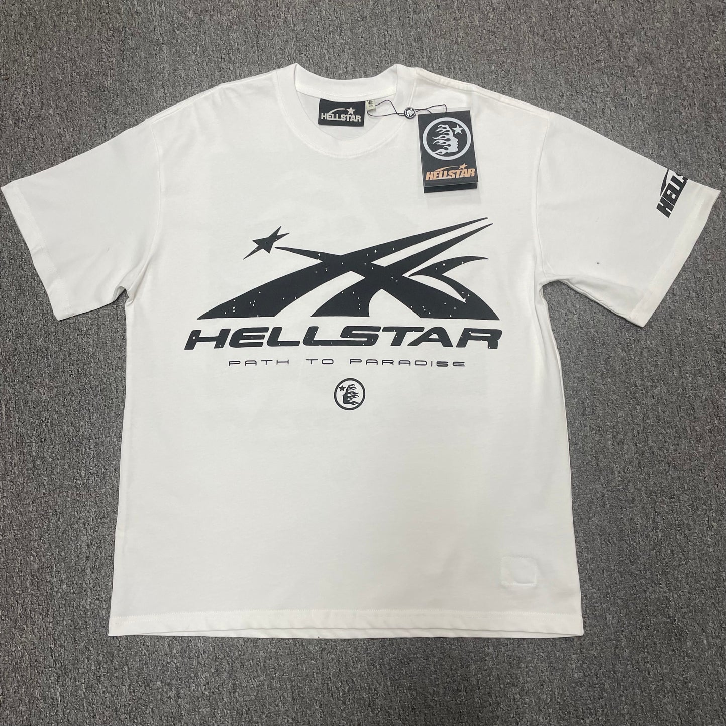 Hellstar Path to Paradise Logo T-Shirt in white front view with oversized black motion-star graphic
