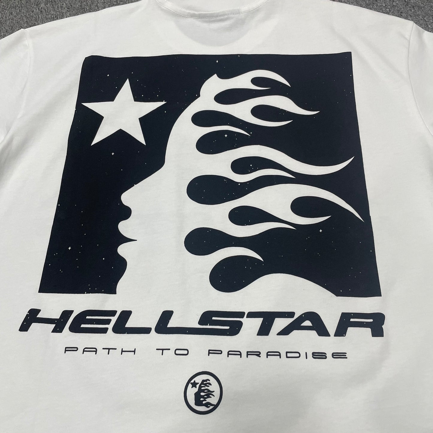 Full black flame-face graphic on the back of the Hellstar Path to Paradise T-Shirt