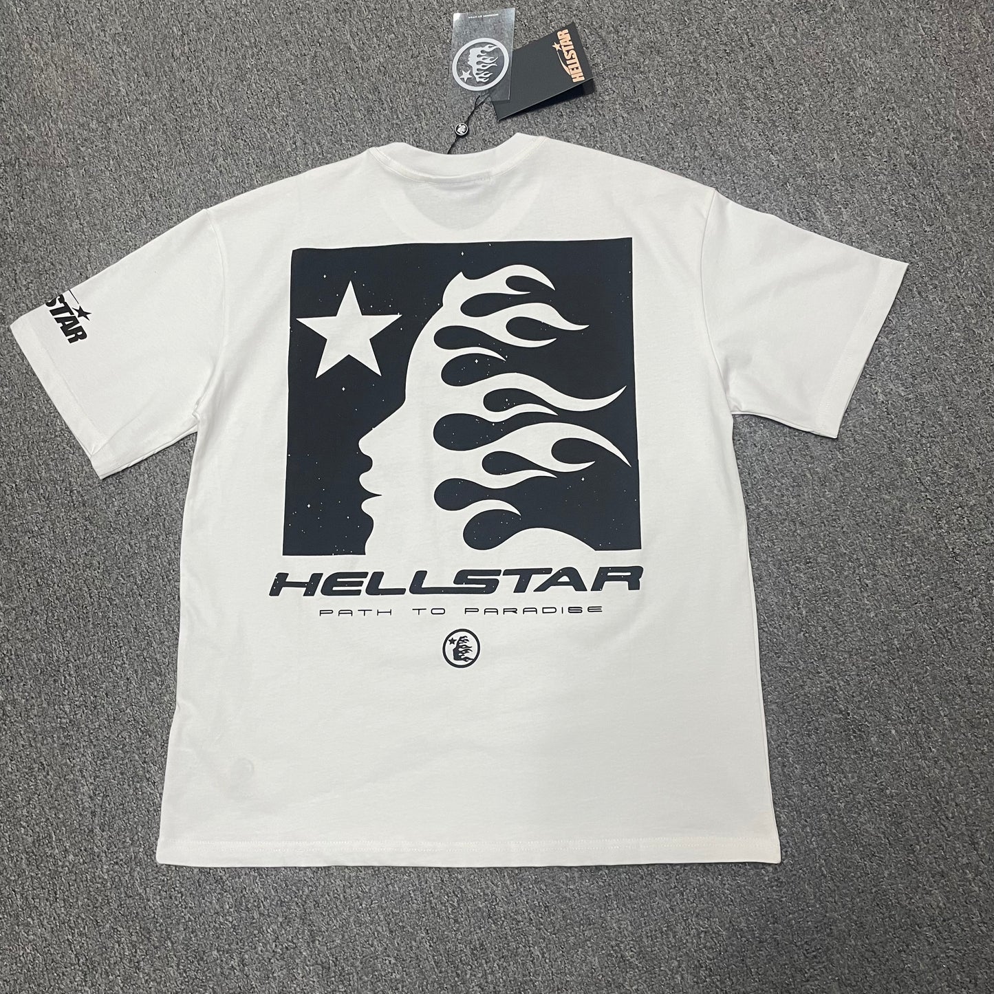 Hellstar Path to Paradise white T-shirt back view with large black flame-face logo graphic