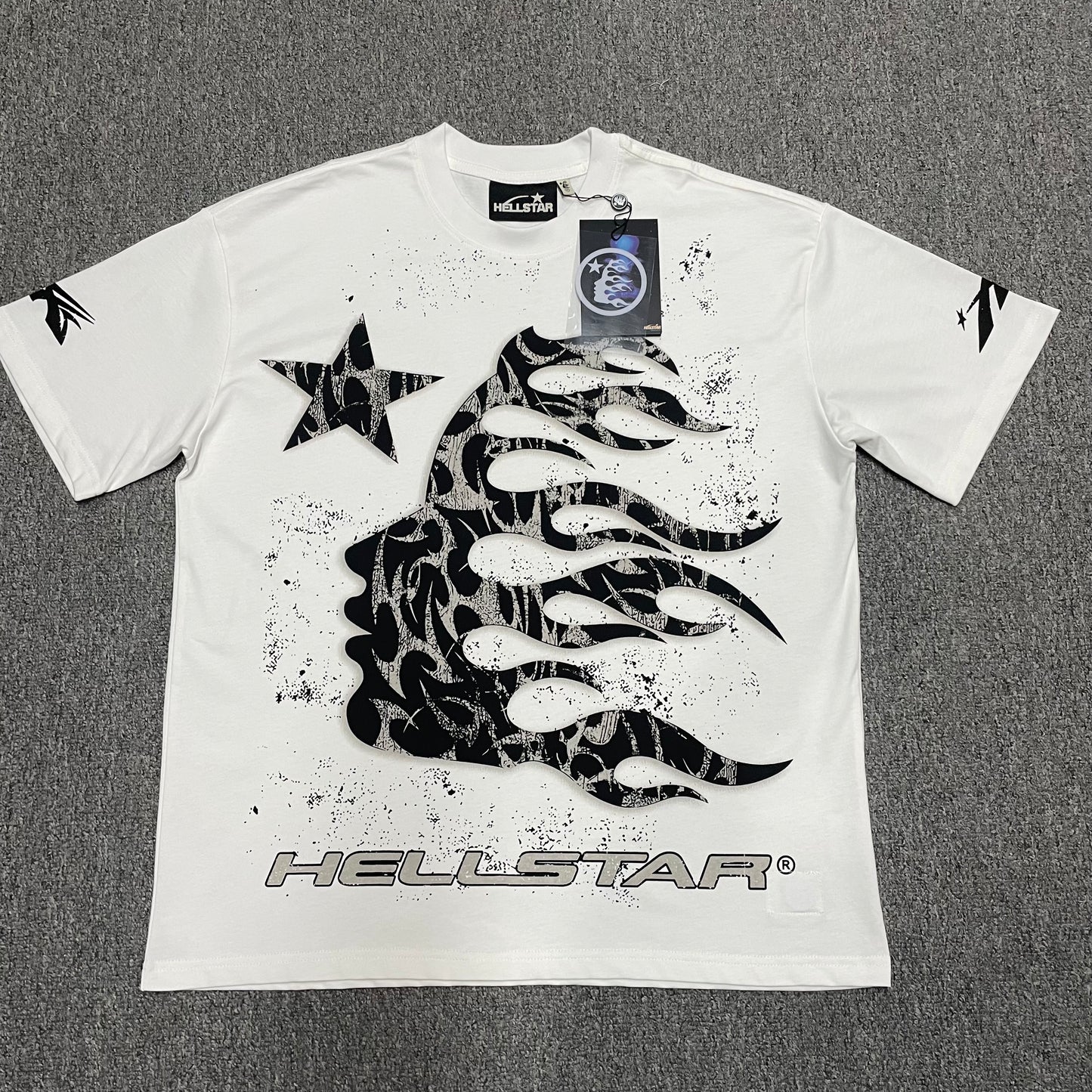 Hellstar Flame Tribal Motion T-Shirt in White front view with oversized black flame-profile graphic