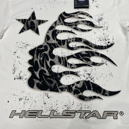 Full black flame-profile graphic printed across the front of the Hellstar Flame Tribal Motion T-Shirt
Close-up of the oversized black tribal flame artwork on the Hellstar graphic T-shirt
Detailed view of the distressed black print texture on the Hellstar Flame Tribal Motion T-Shirt
Black side-profile silhouette with flowing flame details on the Hellstar Flame Tribal Motion T-Shirt
