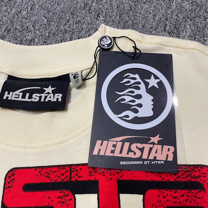 Hellstar branded neck label and crew-neck stitching on the Human Development T-Shirt
Size label detail inside the cream Hellstar Human Development T-Shirt
Cream ribbed crew-neck collar and stitching detail on the Hellstar graphic T-shirt
Front view of the Hellstar flame and star logo hangtag