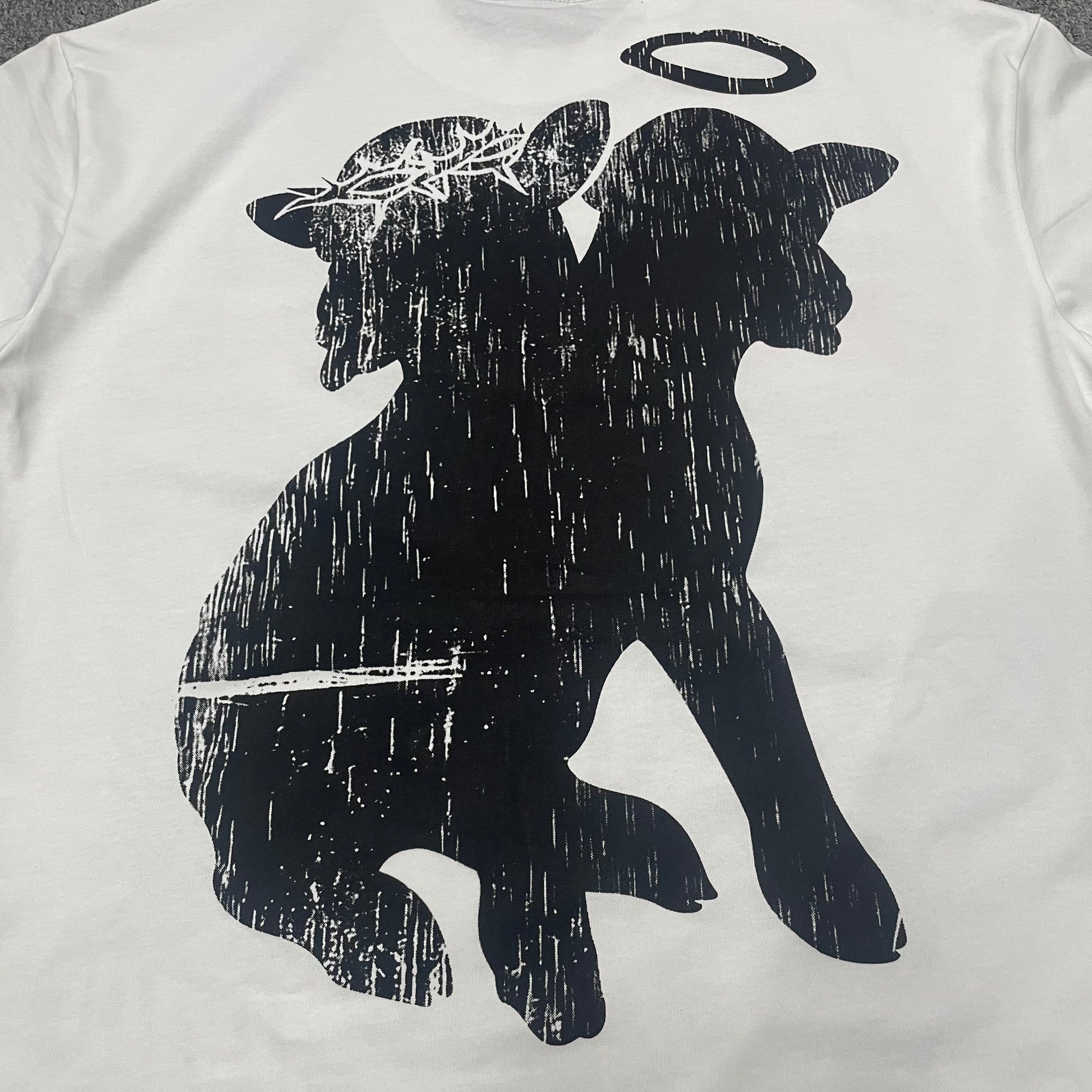 Full back graphic with oversized FAMILY lettering on the Hellstar Sports Family T-Shirt
Large black FAMILY wordmark printed across the back of the white Hellstar T-shirt
Close-up of the distressed black FAMILY lettering on the Hellstar Sports T-shirt
