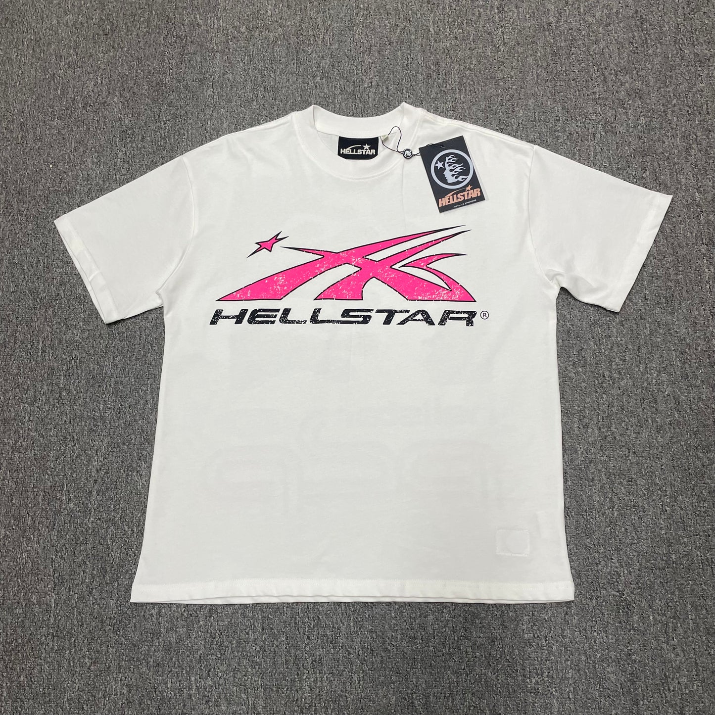 Hellstar Sport Logo T-Shirt in White and Pink front view with oversized motion-star graphic