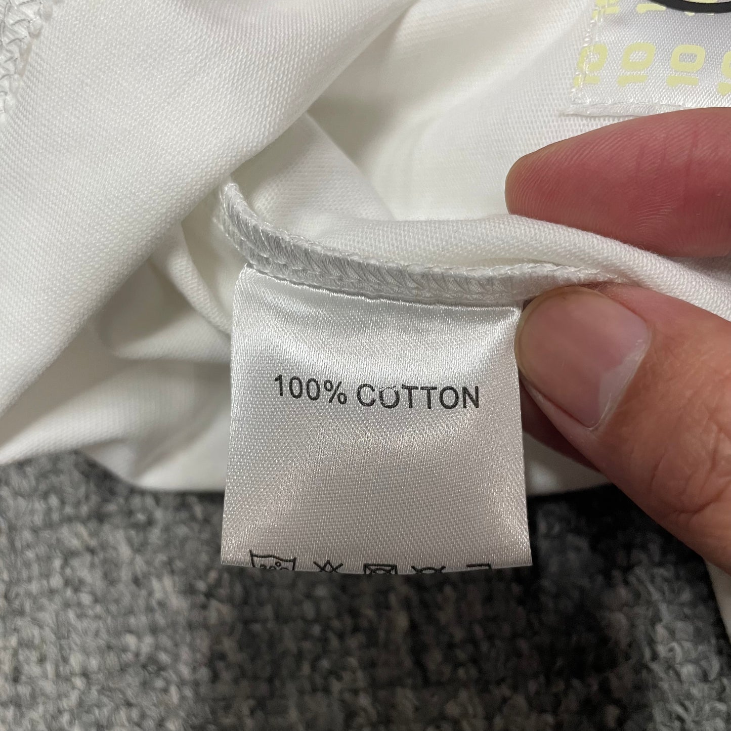Hellstar Sport Logo T-Shirt wash label showing size fabric and garment care information