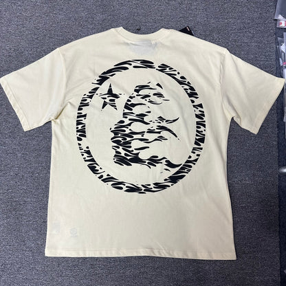 Hellstar Classic Logo cream T-shirt back view with oversized black flame-face emblem