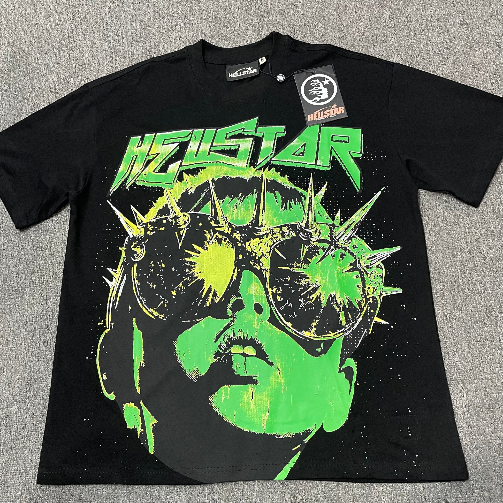 Hellstar The Future T-Shirt in black front view with neon portrait and spiked goggles graphic