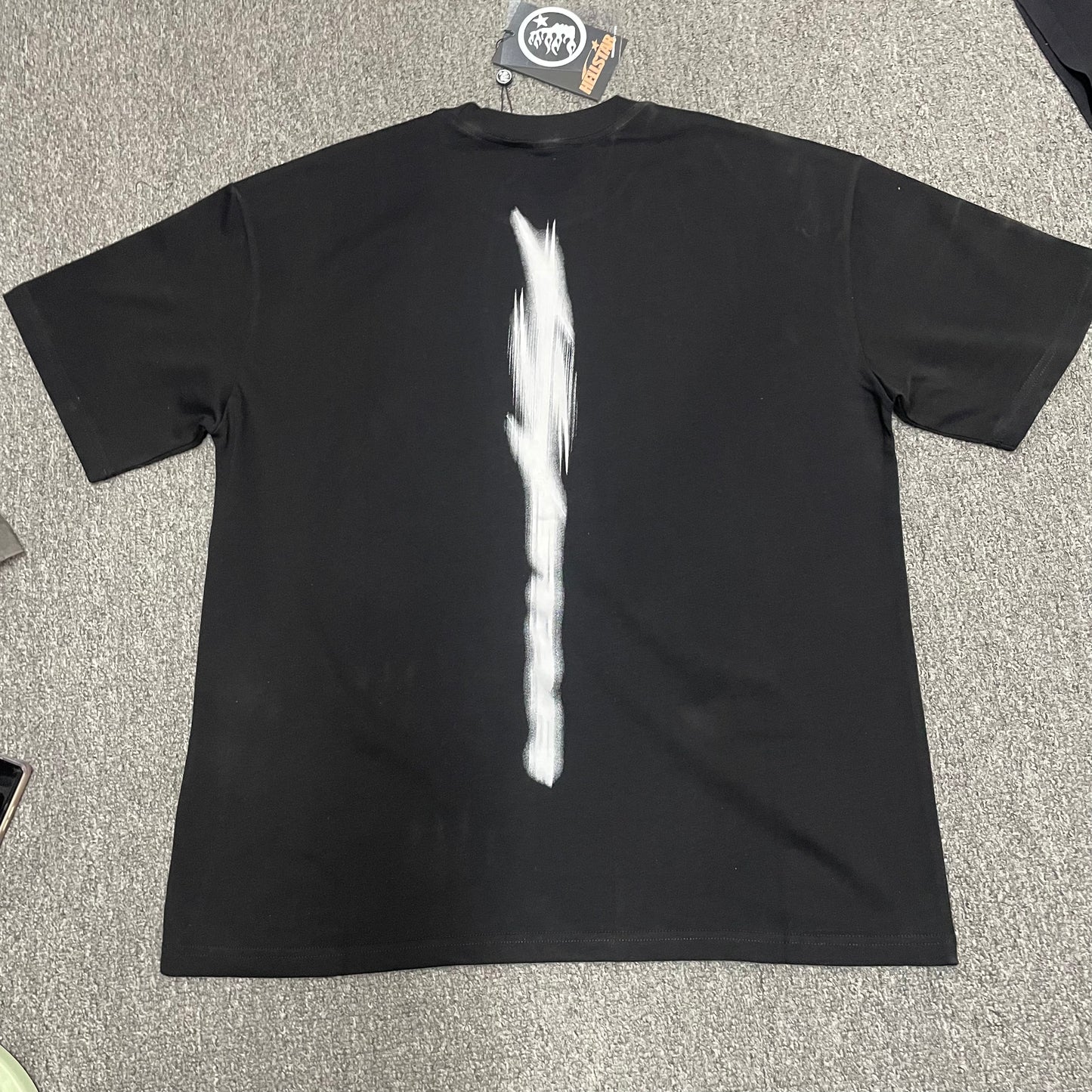 Hellstar Blur black T-shirt back view showing the complete rear graphic artwork