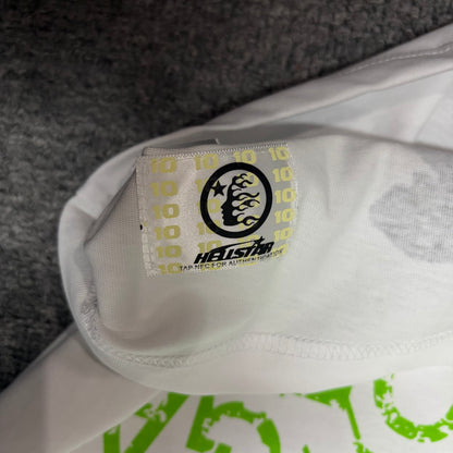NFC tag detail on the Hellstar Reach Your Inner Peace T-Shirt for product inspection
