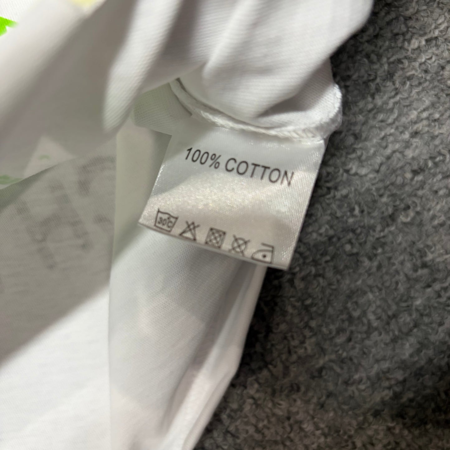 Hellstar Reach Your Inner Peace T-Shirt wash label showing size fabric and garment care information