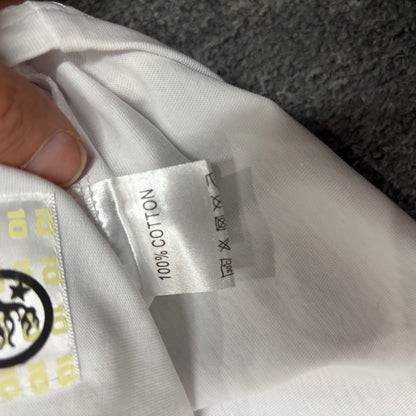 Front view of the Hellstar wash label showing fabric and care details