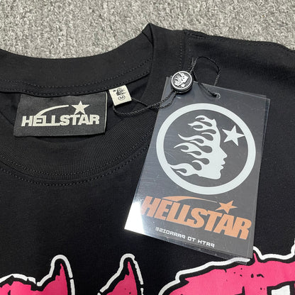Hellstar branded neck label and crew-neck stitching on the Adventure Astronaut T-Shirt
Black ribbed crew-neck collar and stitching detail on the Hellstar graphic T-shirt
Size label detail inside the black Hellstar Adventure Astronaut T-Shirt
Front view of the Hellstar flame and star logo hangtag