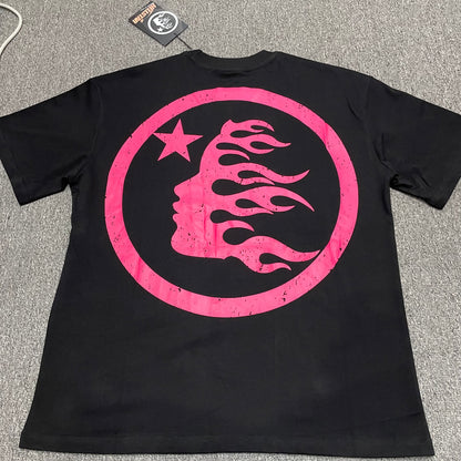 Hellstar Adventure Astronaut black T-shirt back view with oversized pink flame-face emblem