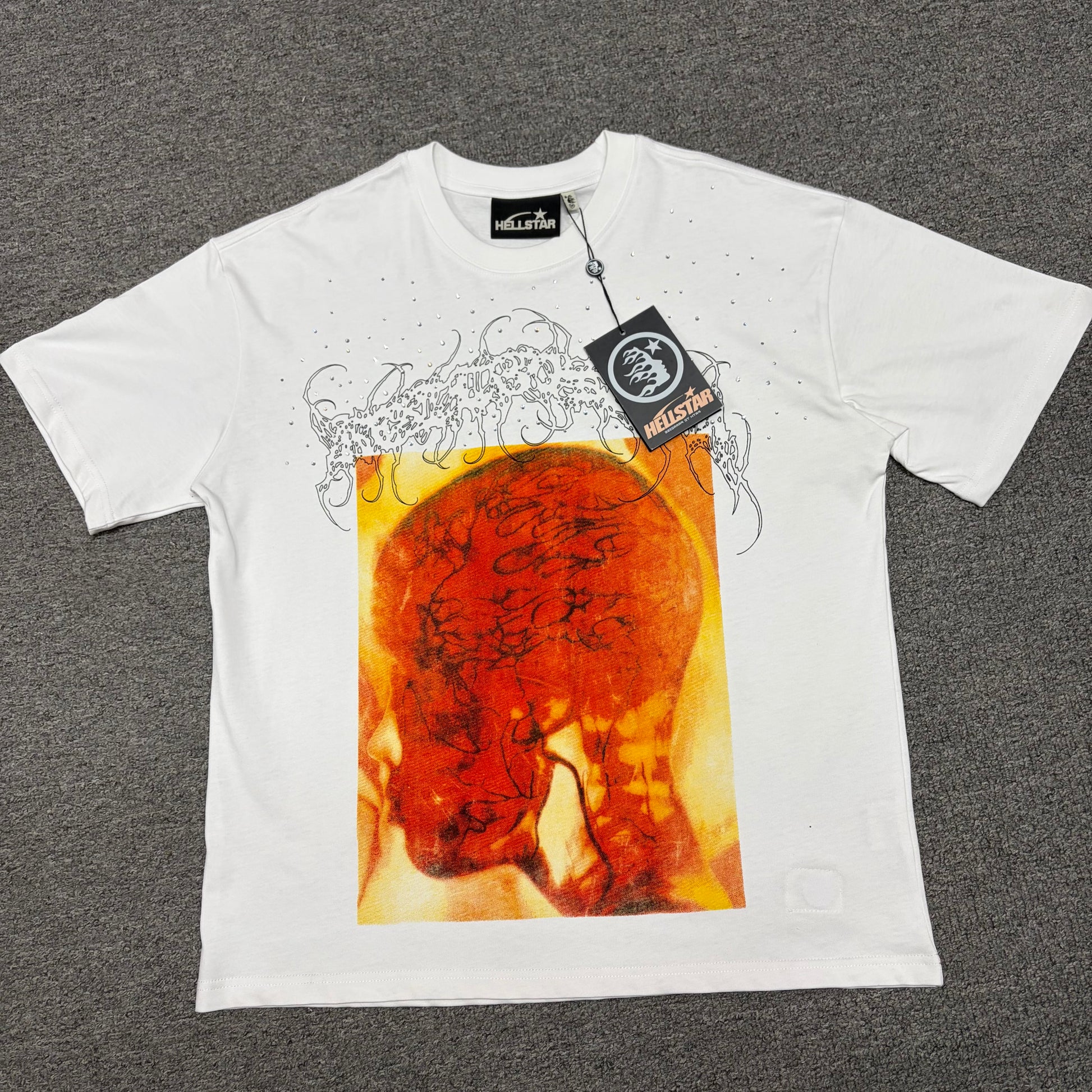 Hellstar Xray Rhinestone T-Shirt in white front view with oversized orange head-scan graphic