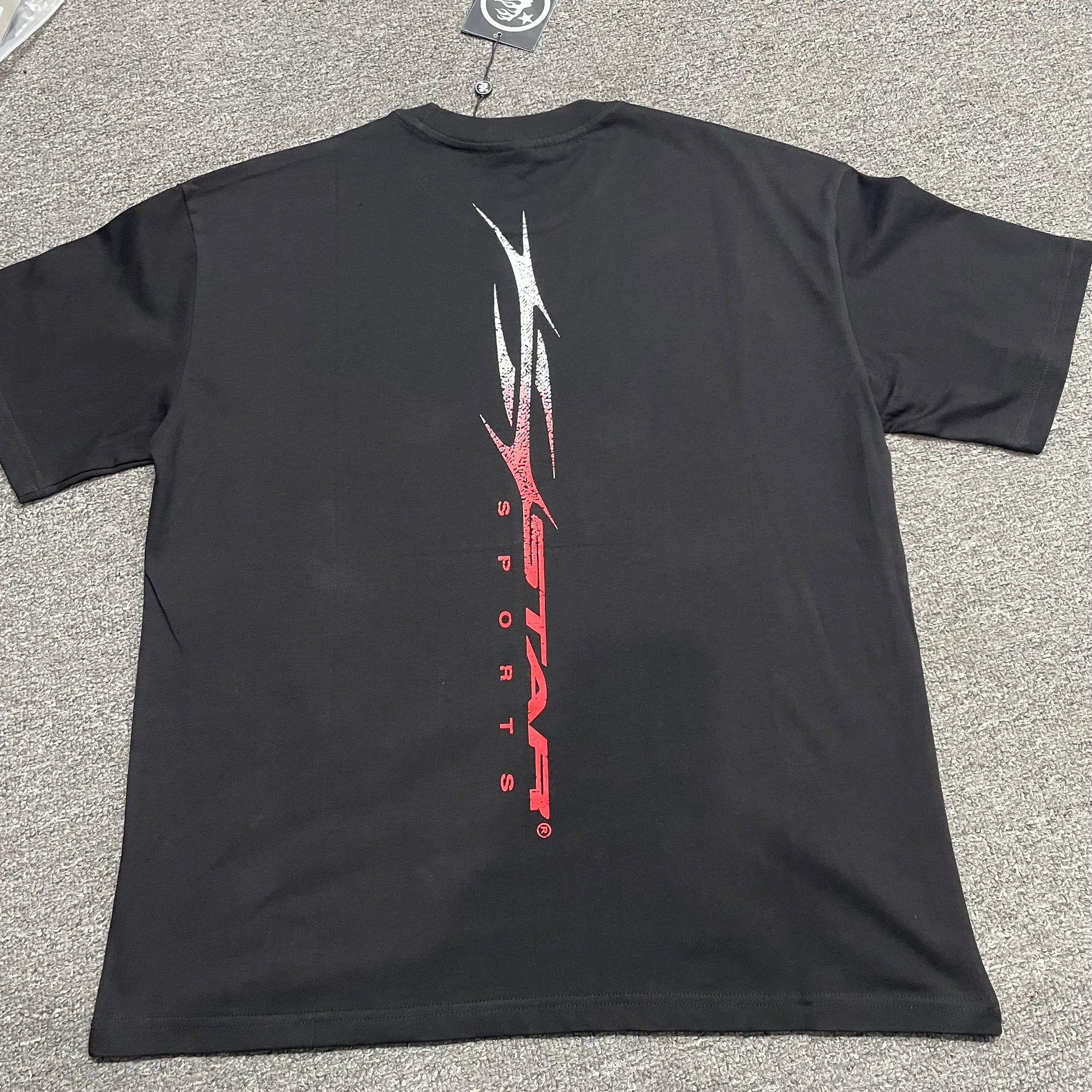 Hellstar Red Gradient Sports Logo black T-shirt back view showing the complete rear design