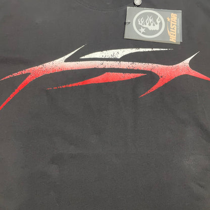 Full red and white gradient sports graphic printed across the front of the black Hellstar T-Shirt
Sharp motion-inspired Hellstar sports logo with red and white gradient artwork
Distressed print effect inside the Hellstar red gradient sports graphic